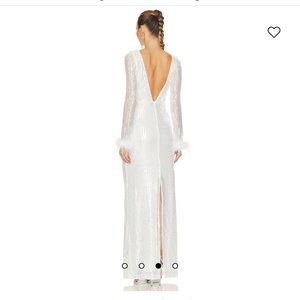 Camila Coelho white small backless gown with beading and feather sleeves